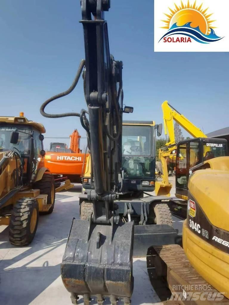 Hyundai R60W vs 小型挖掘机