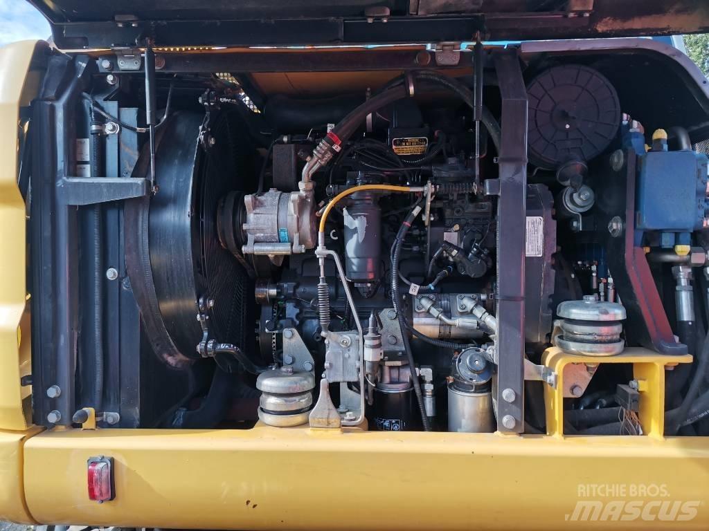 New Holland MH 2.6 轮式挖掘机