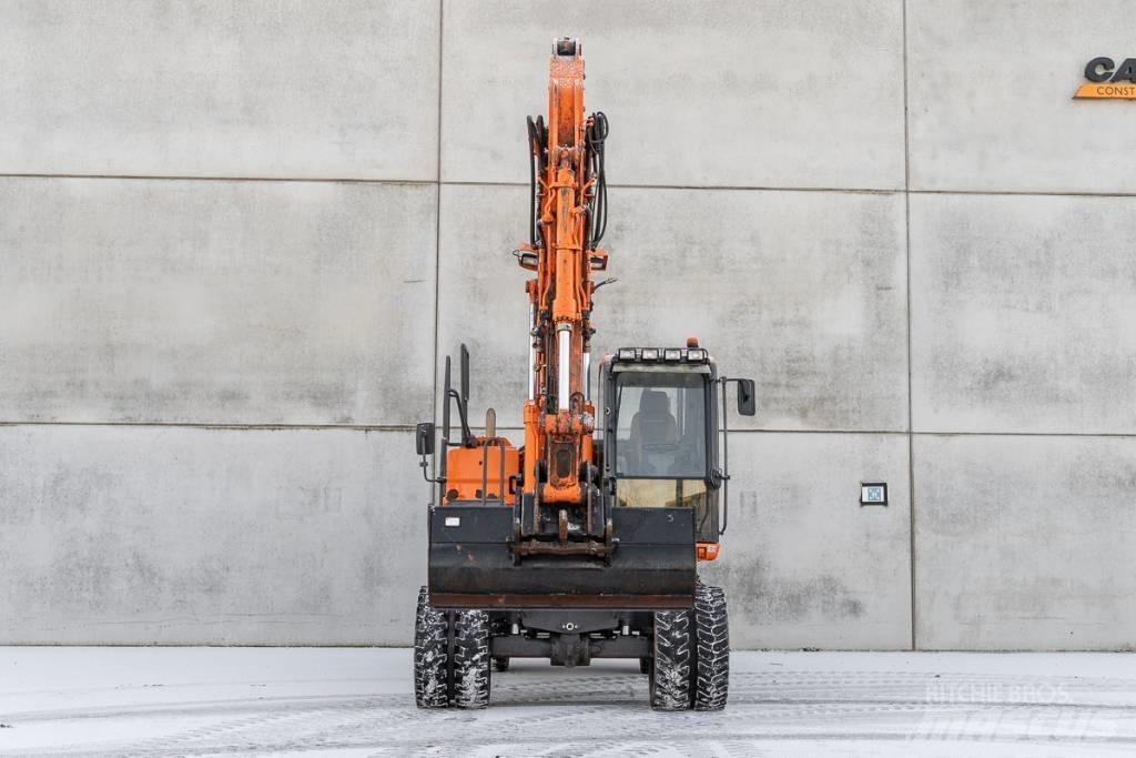 Doosan DX 140 W-3 轮式挖掘机