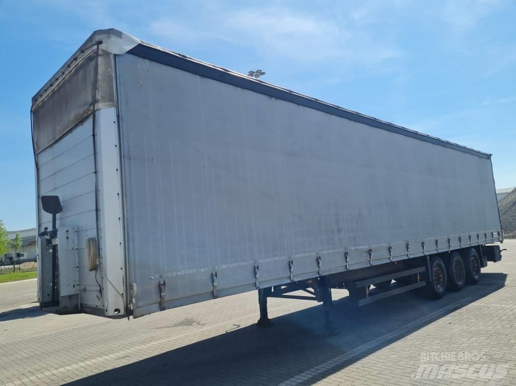 Schmitz SCS 24 侧帘半挂车