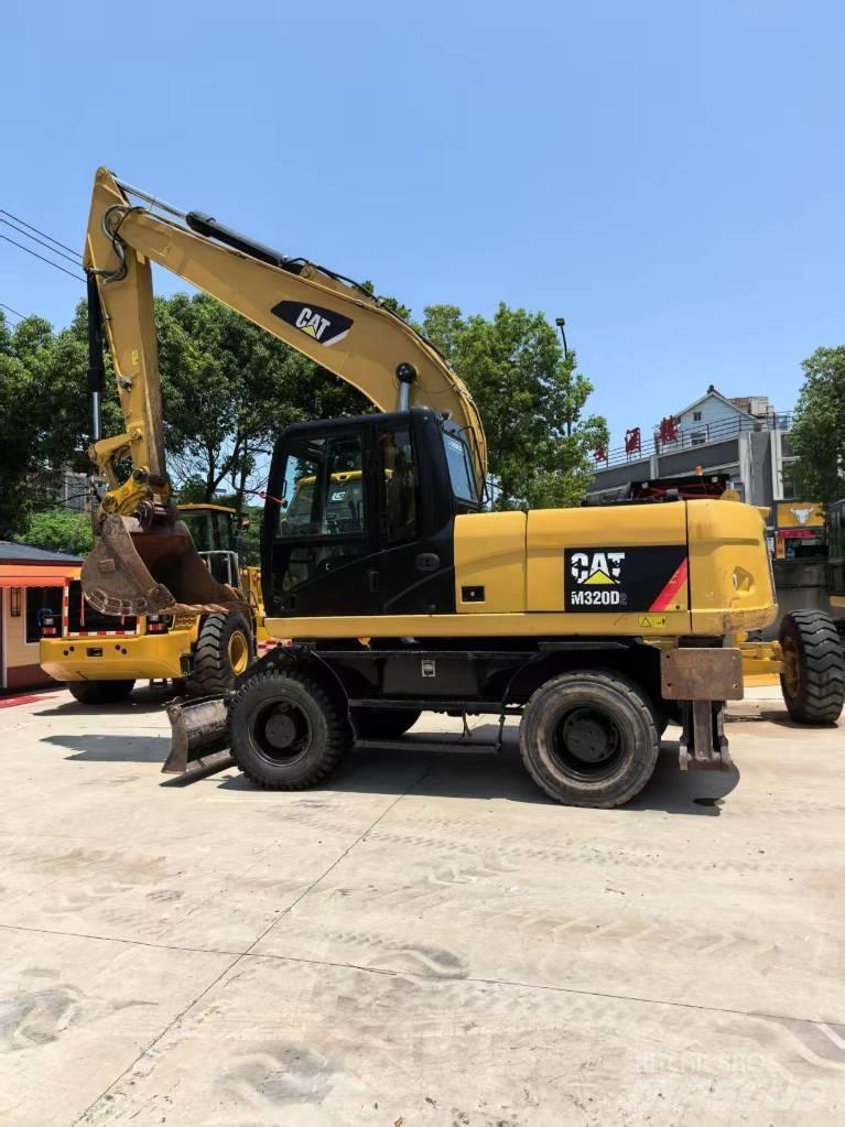 CAT M 320 轮式挖掘机
