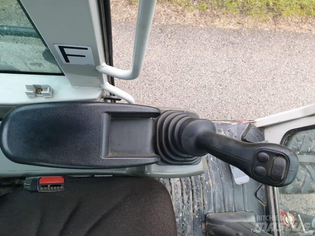 Takeuchi TB 295 W 轮式挖掘机