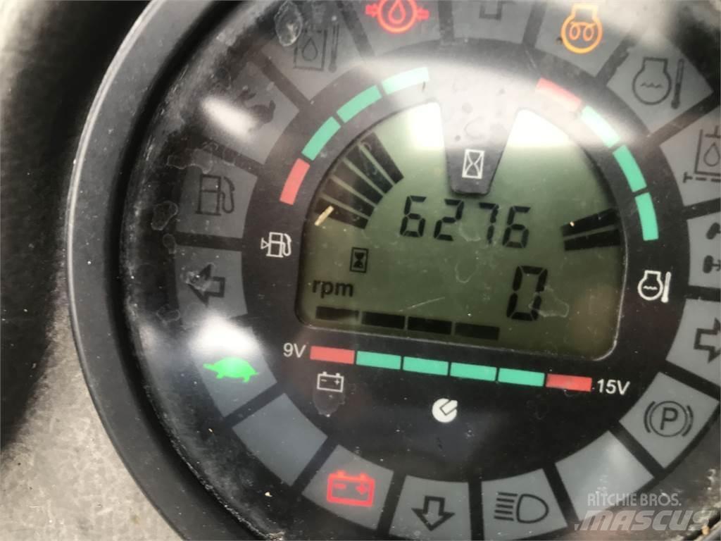 Mustang 406 前装载和挖掘机