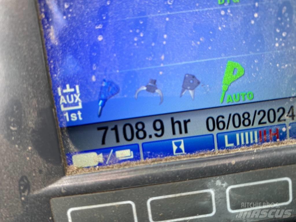 Takeuchi TB 295 W 挖坑机