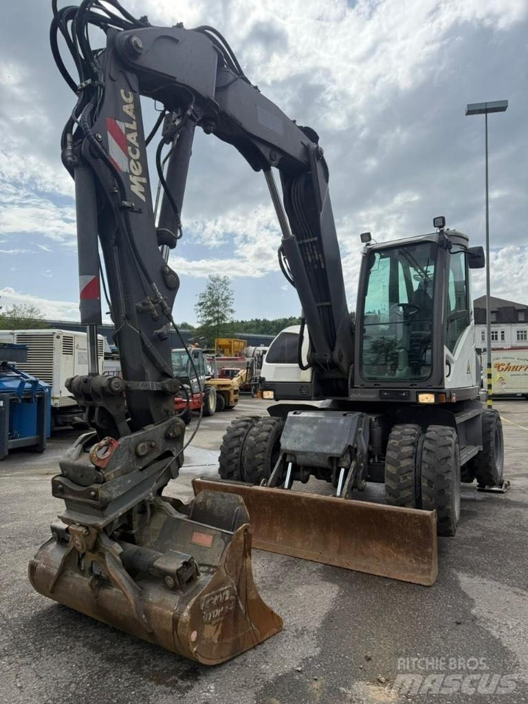 Mecalac 714 MW 轮式挖掘机