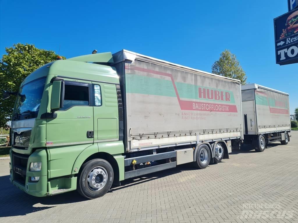 MAN 26.440  7.4 + 7.3 篷布货车