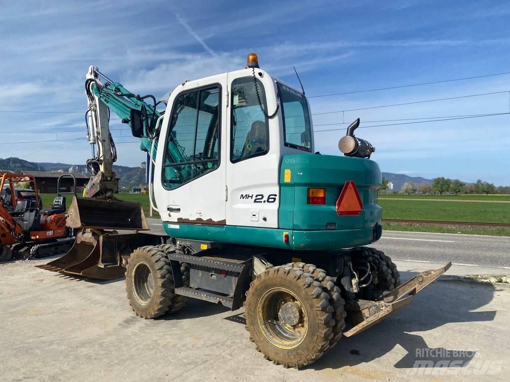 New Holland MH 2.6 轮式挖掘机