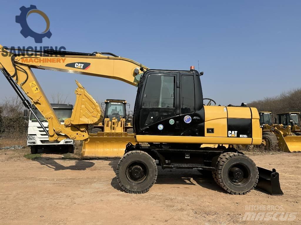 CAT M 320 D2 轮式挖掘机
