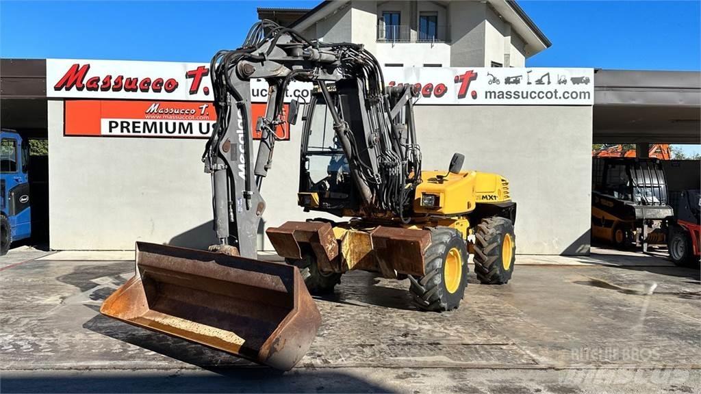 Mecalac 12MXT - E 轮式挖掘机